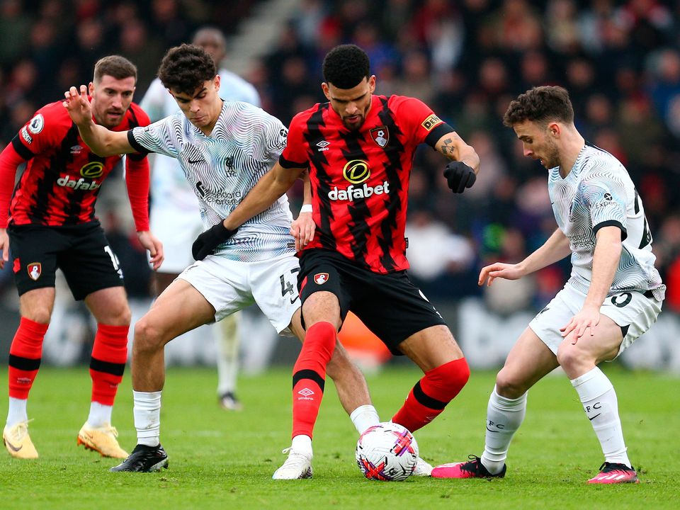 BOURNEMOUTH, ENGLAND - MARCH 11: Dominic Solanke of AFC Bournemouth battles for possession with Stefan Bajcetic and Diogo Jota of Liverpool during the Premier League match between AFC Bournemouth and Liverpool FC at Vitality Stadium on March 11, 2023 in Bournemouth, England. (Photo by Charlie Crowhurst/Getty Images)