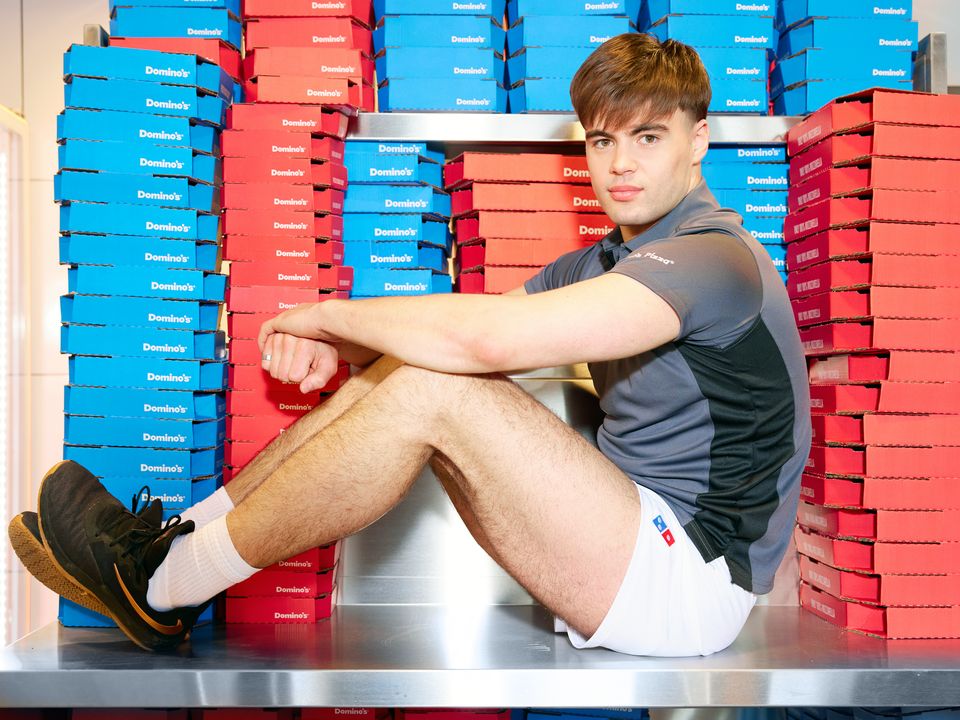 Domino's has opened its latest outlet and the have introduced a special uniform to honour a local hero