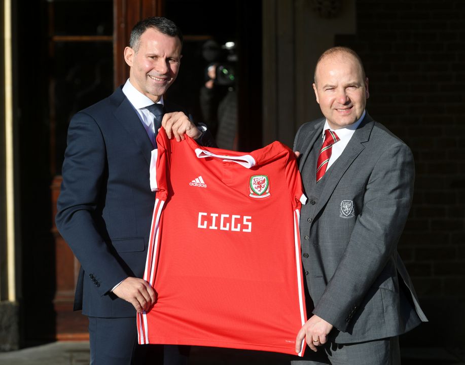 Giggs (left) poses with former Football Association of Wales chief executive Jonathan Ford after being appointed Wales manager in January 2018 (Ben Birchall/PA)