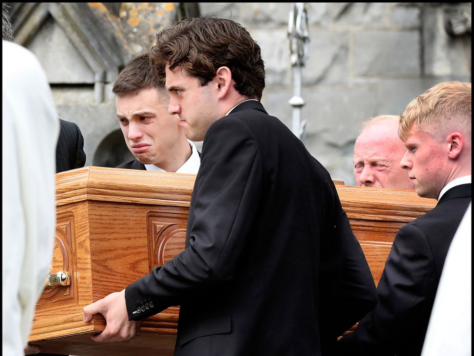 Mrs Cowen’s coffin is taken from St Brigid’s church