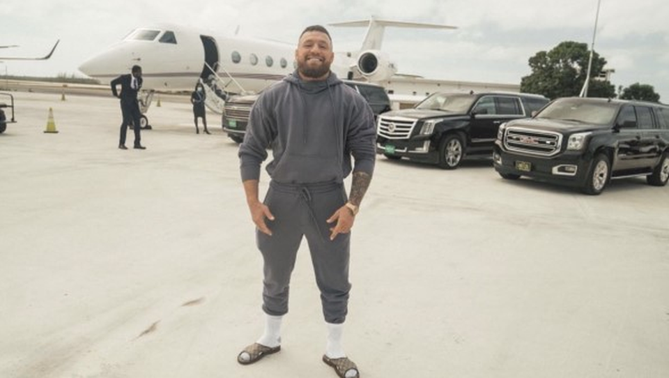 Conor McGregor with his private jet and fleet of luxury cars